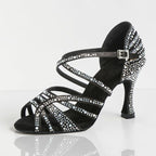 MONROE STORE black strappy ballroom dance heels featuring shimmering crystal embellishments and a secure ankle strap.