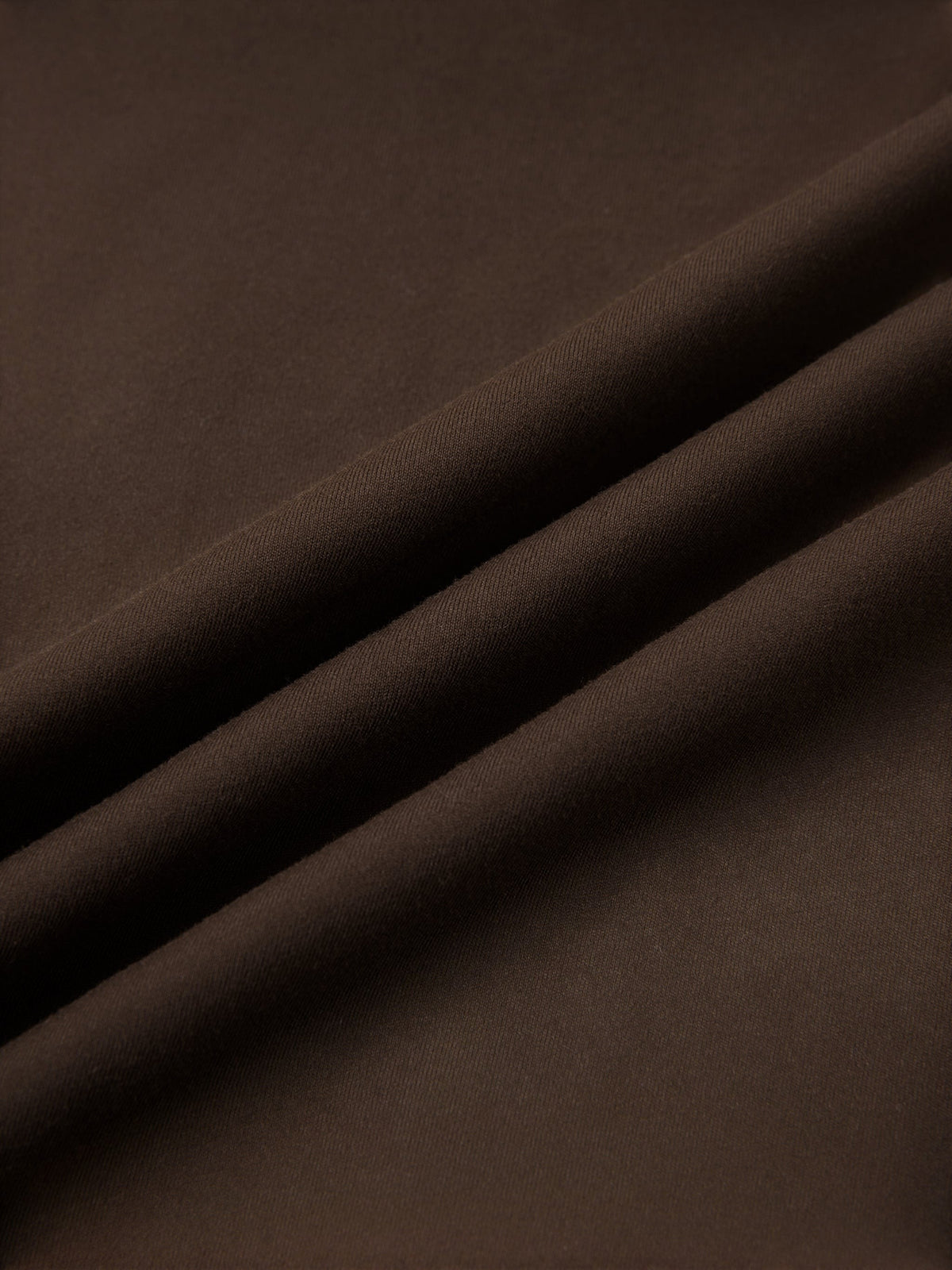 MONROE STORE high-waisted yoga leggings in dark brown, made from a stretchy, opaque fabric.
