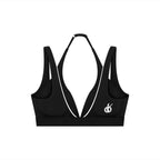 Sujetador deportivo negro con cuello halter de MONROE STORE, diseño elástico y transpirable para yoga y fitness.